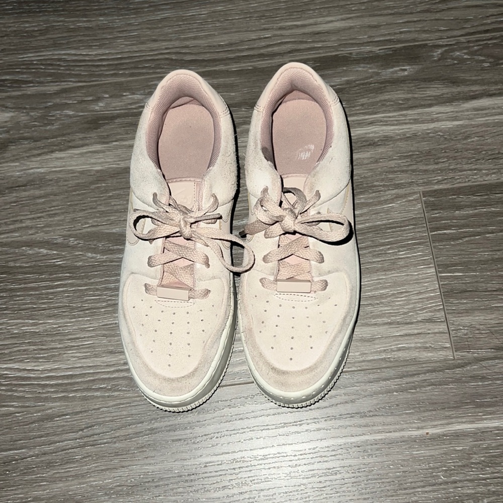 Pink Nike suede sneakers